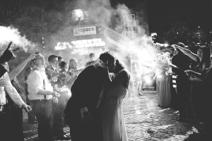 Nighttime. Bride and Groom Sparkler Sendoff with Kiss | Modern, Unique Exposed Brick Tampa Wedding Venue CL Space in Ybor City