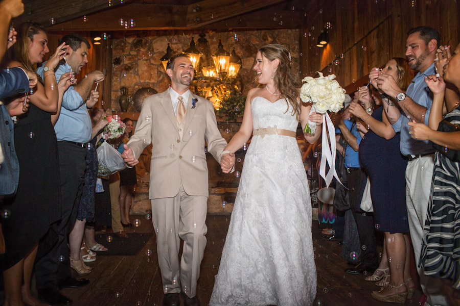 Bride and Groom Wedding Reception Send off Exit with Bubbles | Tampa Wedding Photographer Jeff Mason Photography