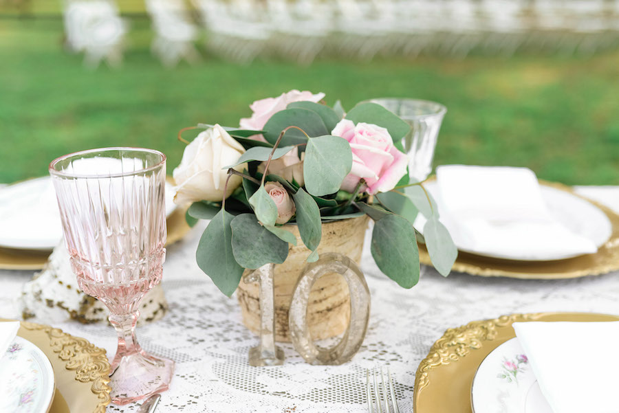 Vintage Wedding Centerpieces with Metal Table Numbers and Vintage Glassware and Chargers | Tampa Wedding Rentals by Ever After Vintage Weddings