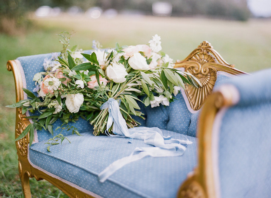 Vintage Wedding Reception Seating with Floral Bouquet | Tampa Wedding Rentals by Ever After Vintage Weddings