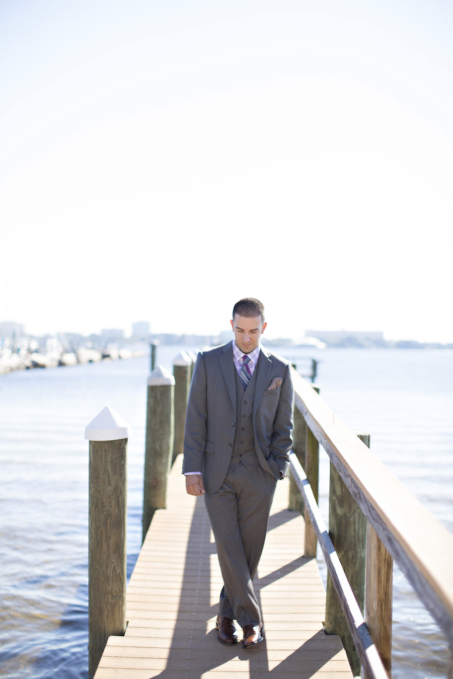 Outdoor Sarasota, Florida Wedding Groom's Portrait on Dock with Grey Wedding Suit | Sarasota Wedding Photography Djamel Photography