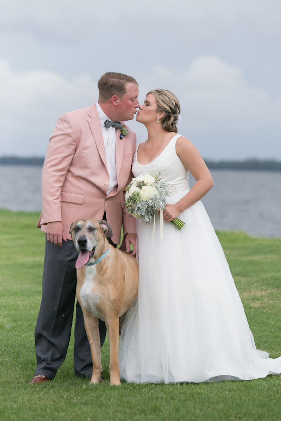 Florida Bride and Groom Wedding Portrait with Dog | Outdoor, Waterfront Florida Bride and Groom First Look | Tampa Wedding Photographer Carrie Wildes Photography