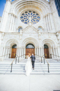Bride and Dad Walking Up Steps of Sacred Heart Church in Downtown Tampa