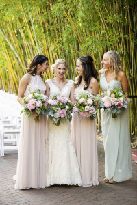 Bride and Bridesmaids Weddin Portriat with Colorful, Pink, Blush, and White Wedding Bouquets and Blush and Mint Green Bridesmaid Dresses
