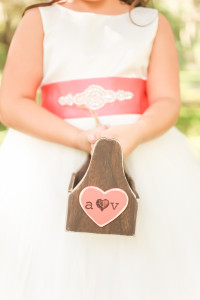 Flower Girl Holding Wooden Box with Flowers