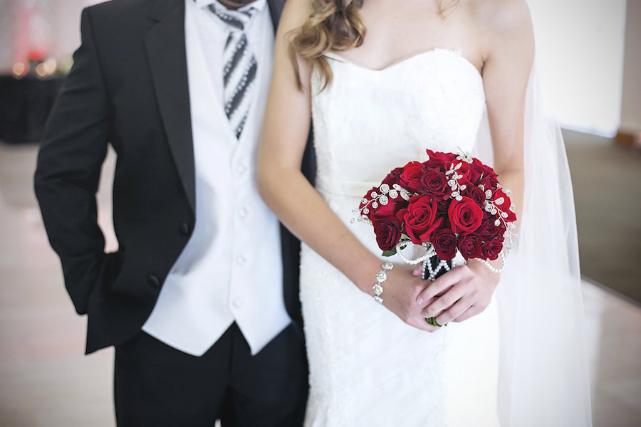 Bride and Groom Modern Wedding Portrait in White, Strapless Wedding Gown and Deep Red Rose Wedding Bouquet | Tampa Wedding Florist Apple Blossoms Floral Design | Tampa Wedding Photographer FotoBohemia