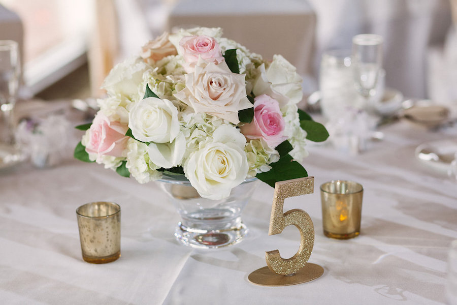 Blush Pink and White Wedding Reception Wedding Centerpieces with Gold Numbers and Floral Decor at Clearwater Venue Countryside Country Club