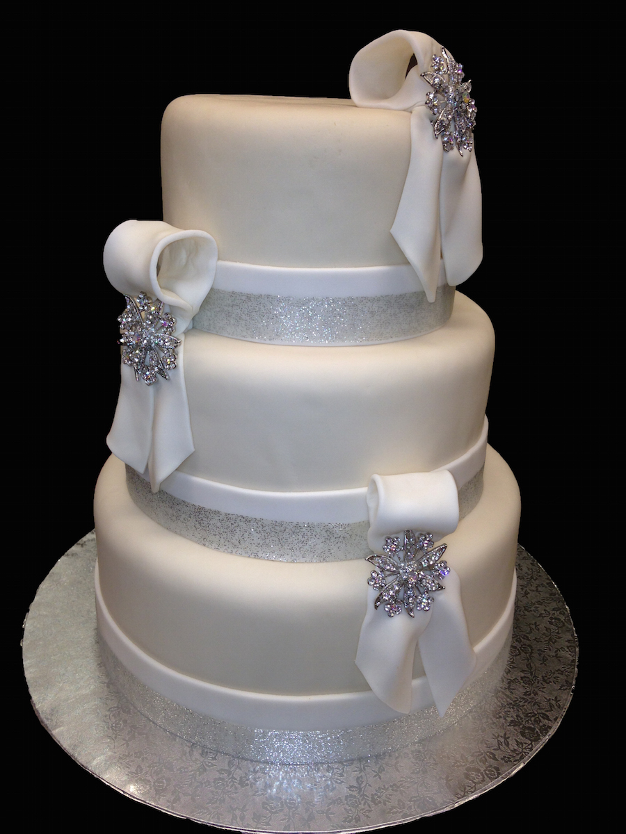 Three Tier Round White & Silver Wedding Cake With Ribbons Bows Rhinestones | Clearwater Wedding Cake Dessert Baker | Corey's Catering & Bakery