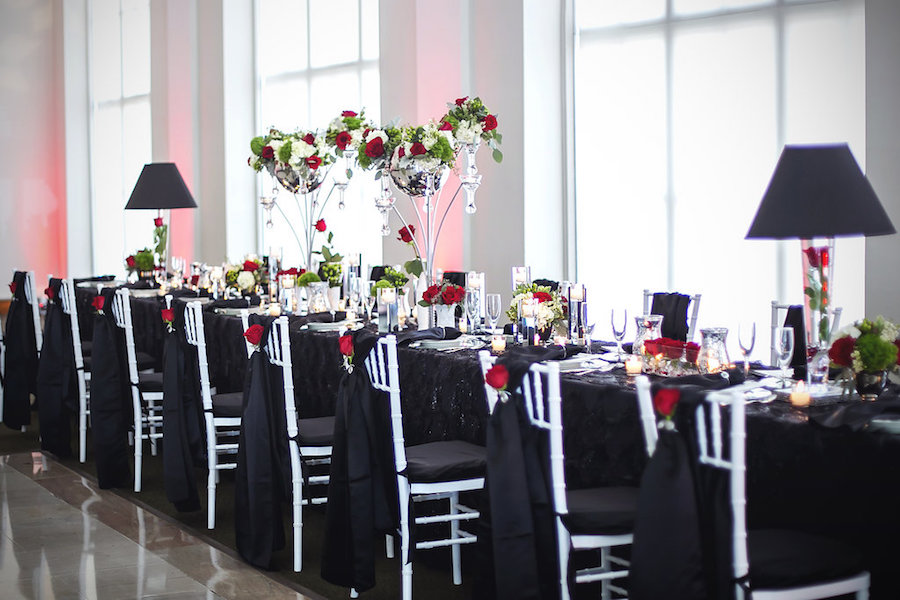 Modern Black Linen, White Chiavari Chairs, and Red, Ivory and Green Centerpieces | Tampa Wedding Florist Apple Blossoms Floral Design