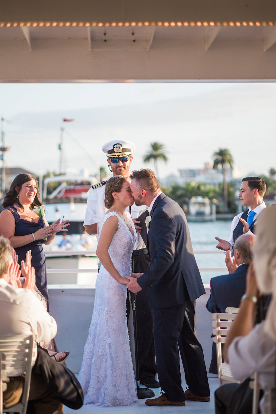 Bride and Groom Wedding Ceremony Kiss Portrait aboard Clearwater Wedding Venue the Yacht Sensation | Jillian Joseph Photography