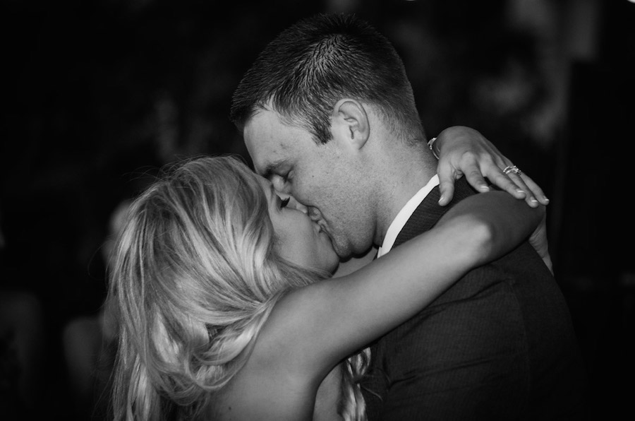 Tampa Bay Bride and Groom Kissing at Wedding Reception | St. Petersburg Wedding DJ and Entertainment Celebrations24