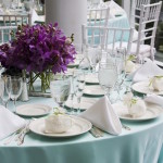 Elegant Wedding Reception Dishes and Place Setting at Tampa Bay Wedding Reception on Teal Linens Tablecloths with White Chiavari Chairs | St. Petersburg Wedding Rentals Rent-All City