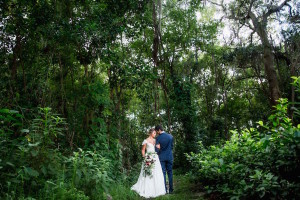 Bride wearing Amsale wedding dress from Blush Bridal Sarasota and Groom Portrait | Southern Inspired Outdoor Wedding Reception Decor Styled Shoot