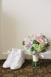 White Nike Bridal Tennis Shoes with Pink Roses and Greenery Wedding Bouquet Detail Clearwater Beach Wedding