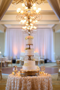 Elegant 4-Tier Round White Wedding Cake with Flowers