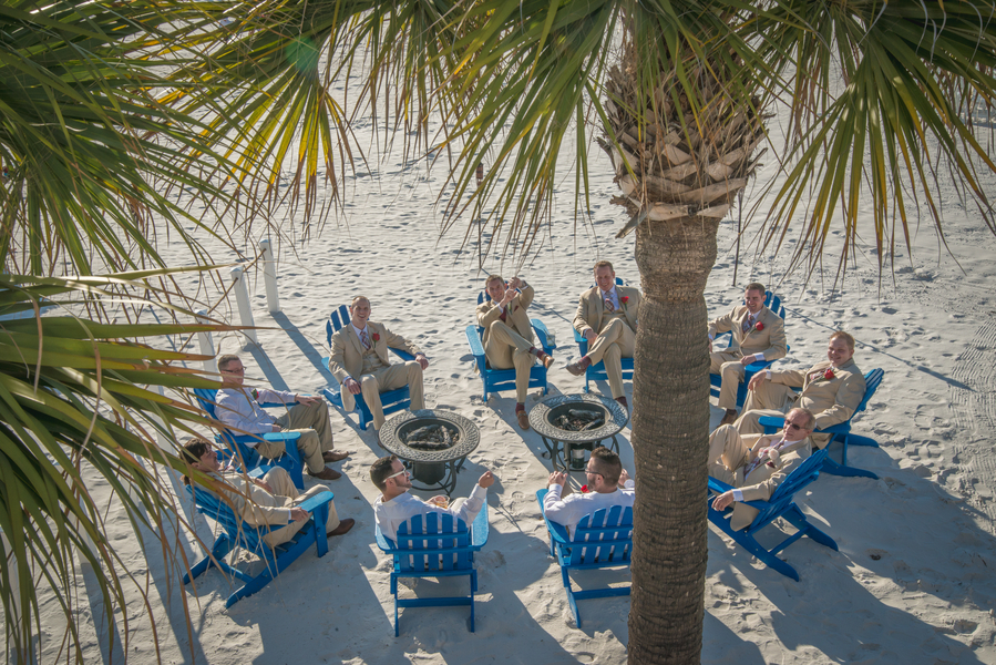 Hilton Beach Clearwater | Groom and Groomsmen Getting Ready Lounging on Beach