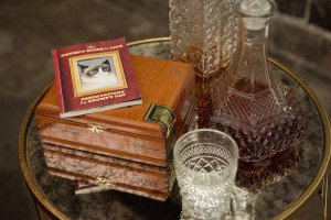 Tampa Bay Wedding Decor Spirits and Cigar Table with Vintage Glasses | Tampa Bay Wedding Designer Ever After Vintage Rentals | Tampa Bay Wedding Photographer Artful Adventures Photography