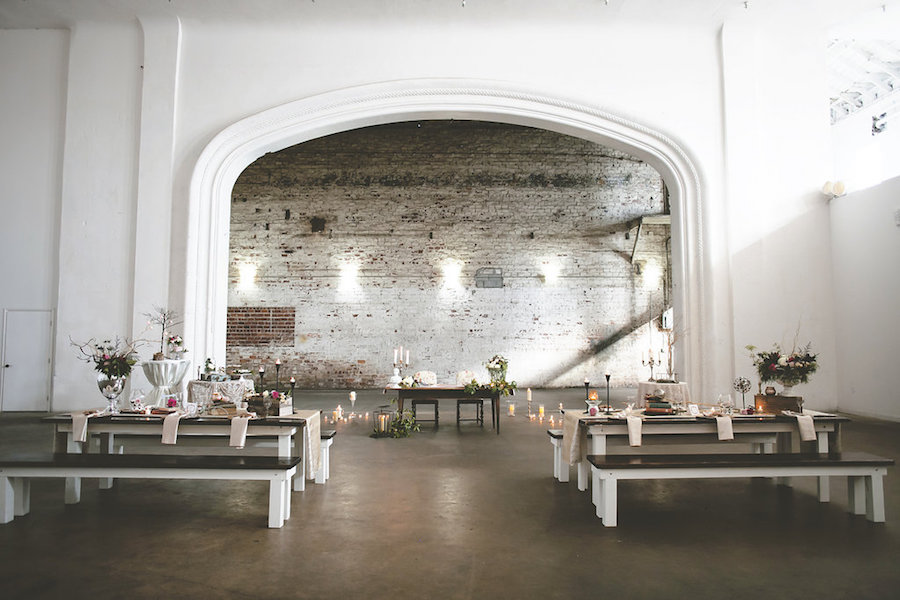 Downtown Tampa Wedding Reception, Urban, Rustic Decor with Wooden Farm Tables, Flowers Chairs, and Candlelight | Rialto Theater | Bohemian/Boho Styled Wedding Shoot