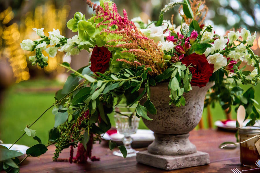 Burgundy Deep Red Wedding Centerpieces with Greenery on Wooden Farm Table | Southern Inspired Outdoor Wedding Reception Decor Styled Shoot