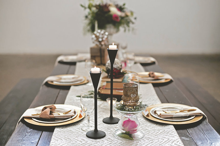 Bohemian/Boho Styled Wedding Shoot Reception Decor | Wooden Farm Tables with Candles, Gold Chargers, and Flowers