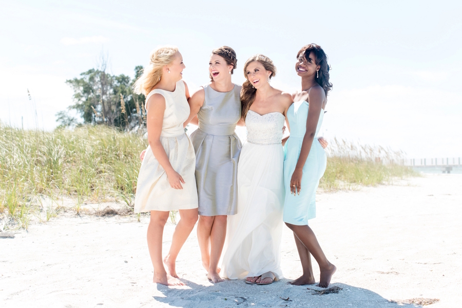 St. Pete Beach Coastal Wedding Portrait, Bride with Bridesmaid in Dessy Bridal Gowns at Beach Wedding| Tampa Bay Wedding Photographer: Caroline & Evan Photography | Tampa Bay Wedding Hair & Makeup By Lasting Luxe Hair & Makeup