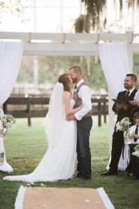 Bride and Groom First Kiss | Rustic Outdoor Tampa Bay Wedding at Wedding Venue Karnes Stables | Tampa Bay Wedding Photographer Jillian Joseph Photography
