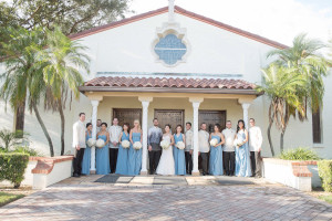 Wedding Ceremony at St. Raphael Catholic Church | Bride & Groom with Bridal Party Portrait in Dusty Blue Bridesmaids Dresses | Photo by Tampa Bay Wedding Photographer Kristen Marie Photography