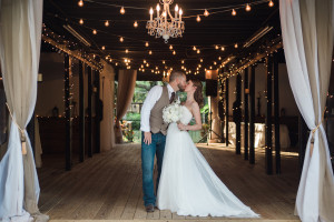 Bride and Groom Kissing Portrait | Rustic Outdoor Tampa Bay Barn Wedding Venue Karnes Stables | Tampa Bay Wedding Photographer Jillian Joseph Photography