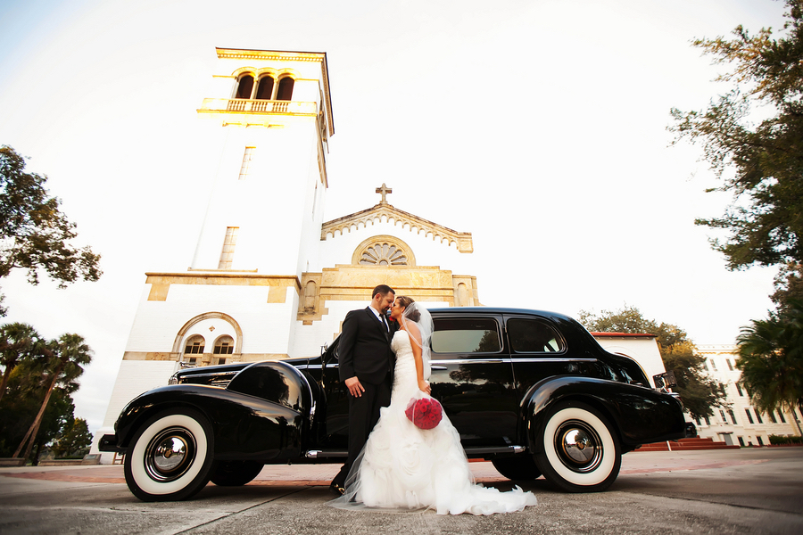 Wedding Portrait of Bride and Groom with Vintage Car at Tampa Bay Wedding Ceremony Venue St. Leo Abbey Church| Photo by Tampa Bay Wedding Photographer Limelight Photography
