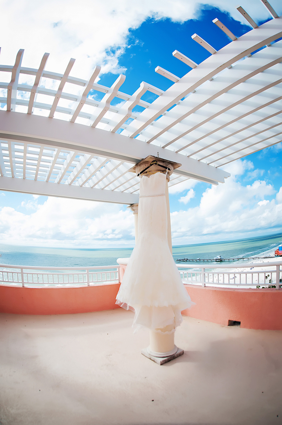 Strapless, Ivory Wedding Dress on Terrace of Hyatt Regency Clearwater Beach | Clearwater Beach Wedding Photographer Limelight Photography