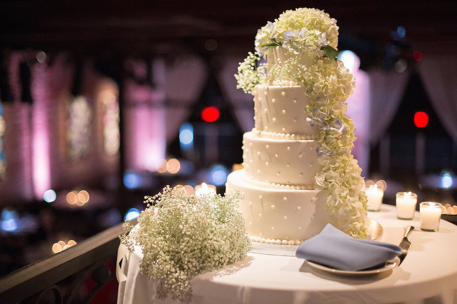 Four Tier White Wedding Cake by Corey's Bakery with Hydrangea Floral Detail | Photo by Tampa Bay Wedding Photographer Kristen Marie Photography