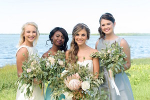 Unique Light Pastel Pink and Blue Wedding Bouquet | Wedding Portrait, Bride with Bridesmaids in Grey and White Dessy Bridal Gowns at Beach Wedding | Tampa Bay Wedding Photographer, Caroline & Evan Photography| Tampa Bay Wedding Hair & Makeup By Lasting Luxe Hair & Makeup