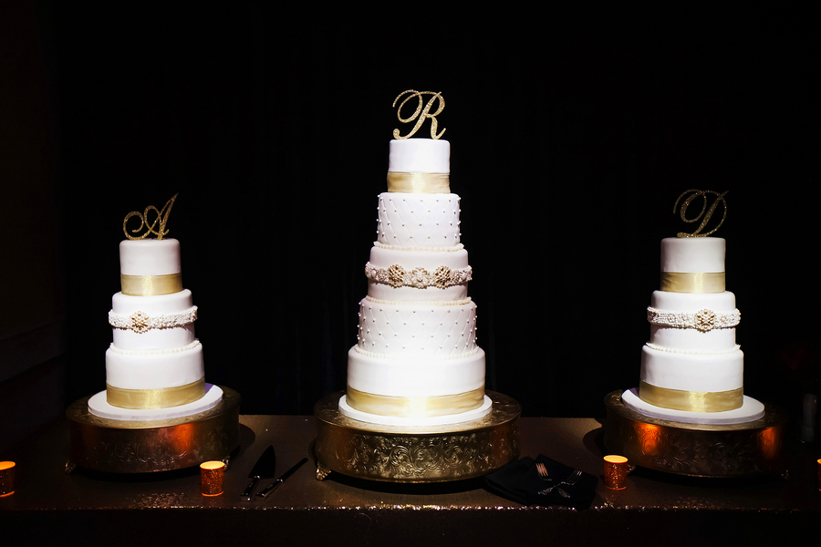 Five Tier Custom Wedding Cake Detail with Gold and White Brocade Accent and Monogram Cake Topper | Photo by Tampa Bay Wedding Photographer Limelight Photography