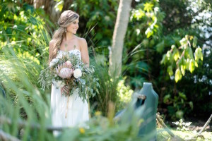 Bridal Wedding Day Portrait in Strapless Chiffon Gown | Lush Greenery Wedding Bouquet with Proteas | St. Pete Wedding Photographer | Caroline & Evan Photography| Tampa Bay Wedding Hair & Makeup By Lasting Luxe Hair & Makeup