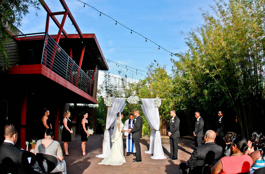 St. Petersburg Outdoor Wedding Ceremony with White Alter with Draping and Flowers at NOAV 535