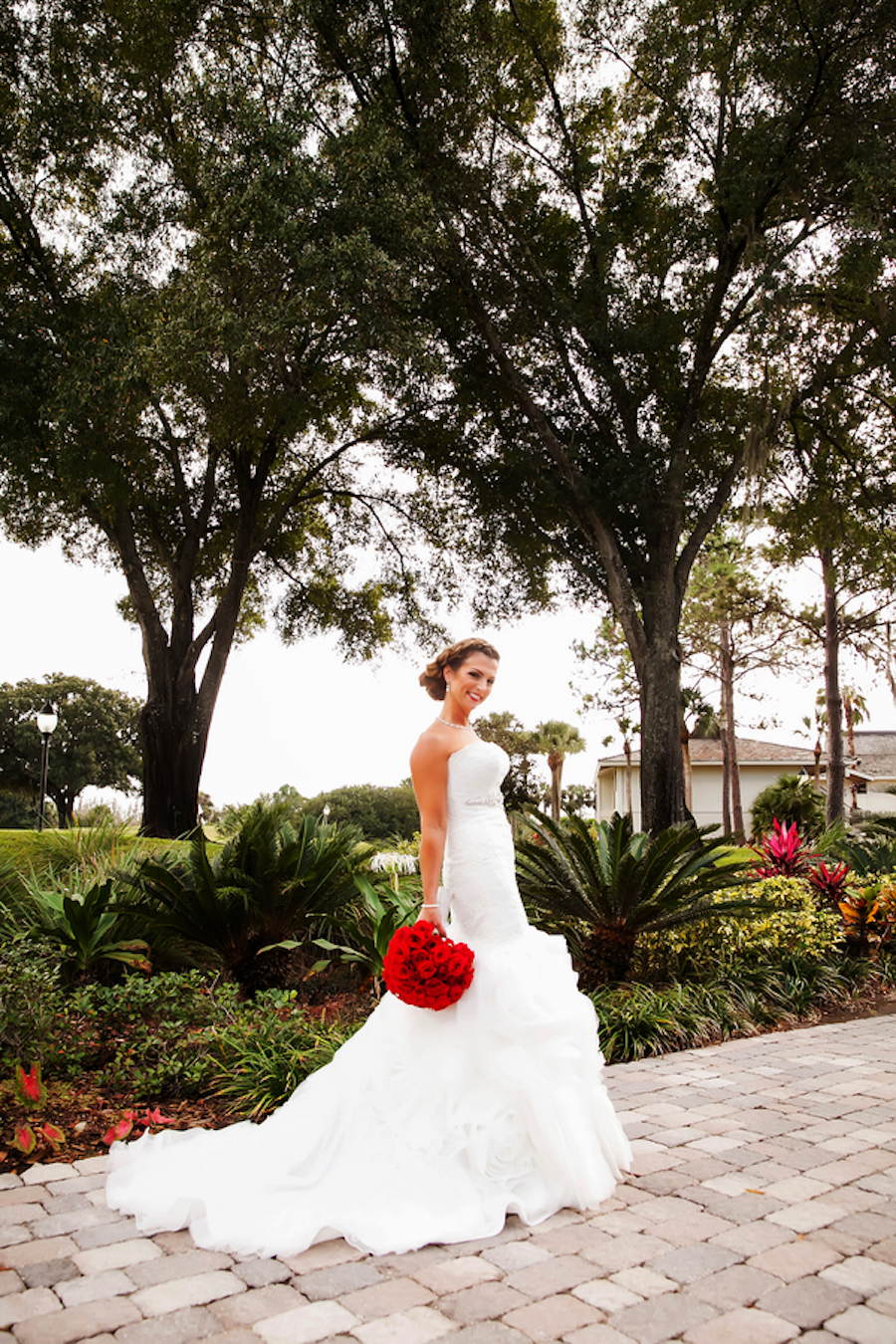Bridal Wedding Day Portrait with Red Rose Bouquet | Photo by Tampa Bay Wedding Photographer Limelight Photography