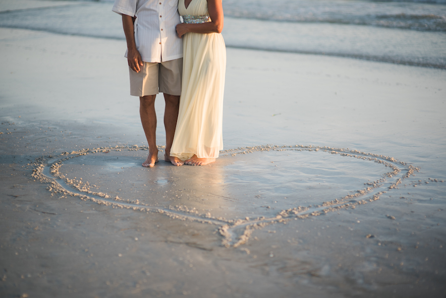 Bride and Groom Indian Rocks Beach Wedding Portrait with Sand Drawn Heart | St. Pete Beach Wedding Photographer Kera Photography