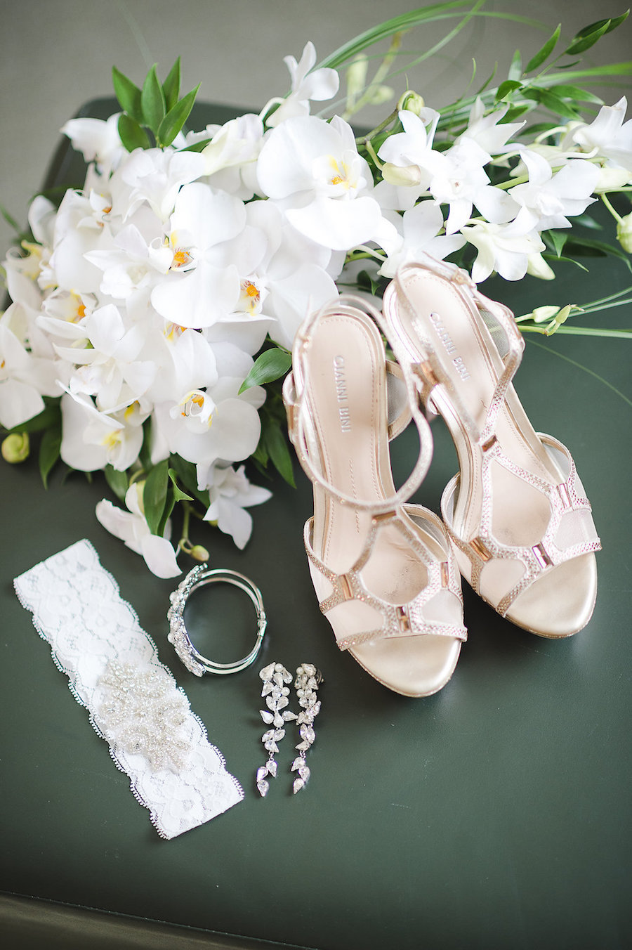 Getting Ready: Bride's Garter, Metallic Strappy Wedding Shoes, Jewelry with White Wedding Bouquet | Tampa Wedding Photographer Marc Edwards Photographs