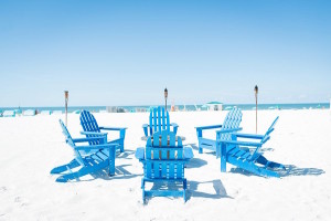 Clearwater Beach Wedding Blue Beach Chairs and Tiki Torches