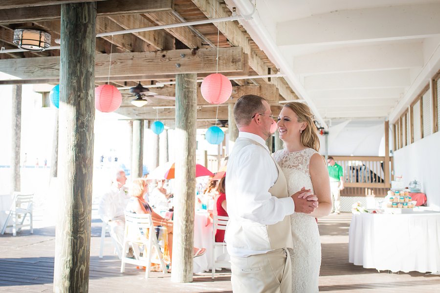 Bride and Groom First Dance at Outdoor, Beach Waterfront Wedding Reception | Clearwater Wedding Venue Hilton Clearwater Beach