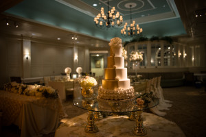 5 Tiered Gold and Ivory Round Wedding Cake with Flower Accents