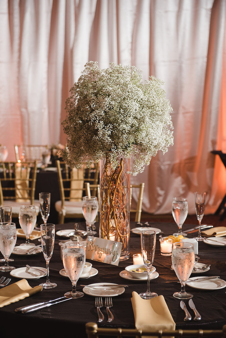 Unique Wedding Centerpiece with Baby's Breath and Vine Branches| Tampa Wedding Planner Kimberly Hensley Events | Picture by Tampa Bay Wedding Photographer Marc Edwards Photographs
