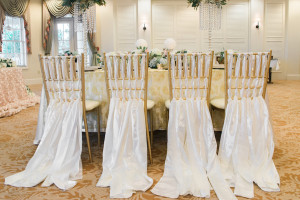 Wedding Reception Decor with Gold Chiavari Chairs and Ivory, Braided Chair Cover Linens