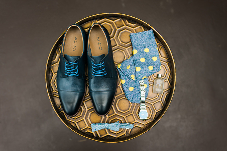 Getting Ready: Groom Wedding Details with Blue Aldo Dress Shoes, Blue and Yellow Polka Dot Dress Socks, Blue Bowtie, and Watch Portrait