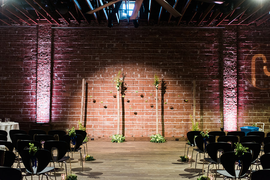 Indoor, St. Petersburg Wedding Ceremony at NOVA 535 with Brick Wall and Hanging Floral Wedding Altar