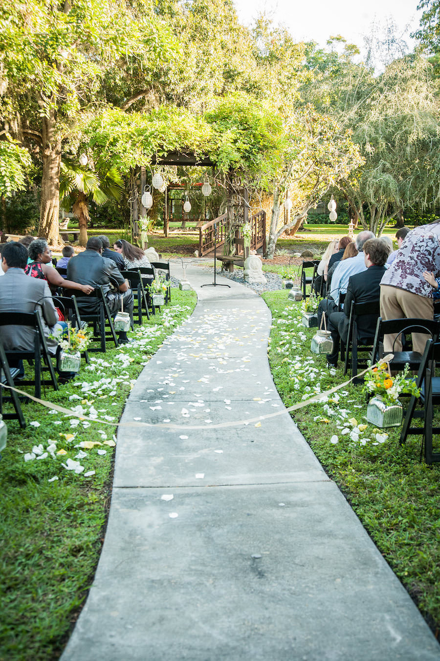 St. Petersburg Outdoor Wedding Ceremony with Yellow and Green Flowers and Altar with Greenery | St. Petersburg Wedding Florist Wonderland Floral Art and Gift Loft