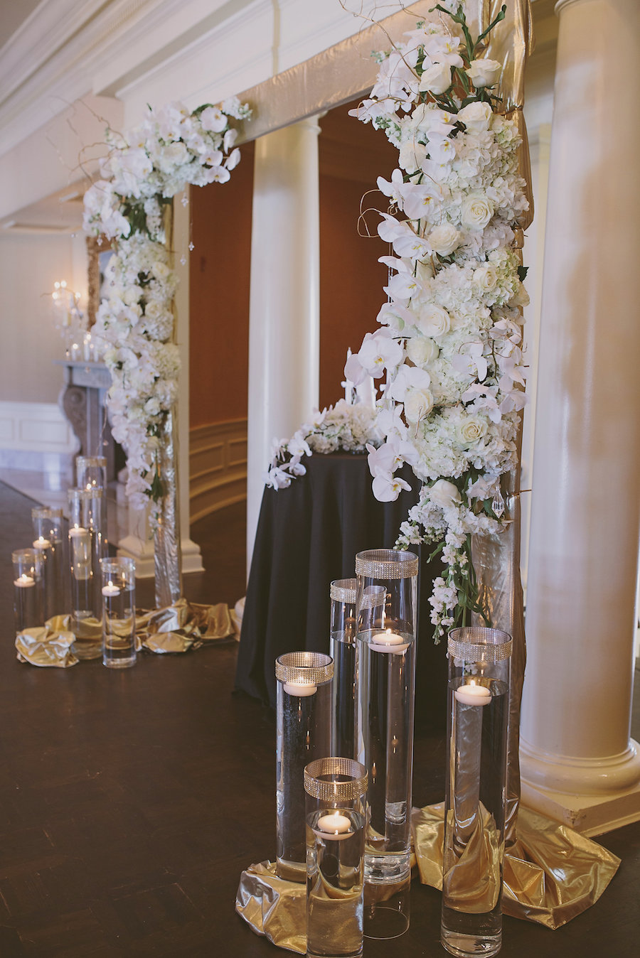 White Orchid, Roses, Floating Candle Vases at Wedding Ceremony Altar | Sarasota Wedding Planner NK Productions