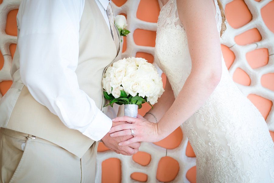 Destination Florida Bride and Groom Wedding Portrait Holding Hands with White Wedding Bouquet