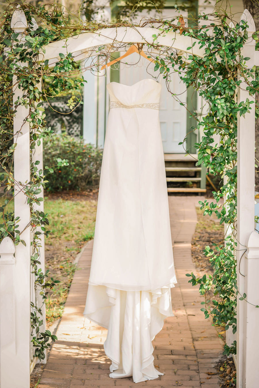 Strapless White Wedding Gown with Wire Hanger in front of Historical Tampa Bay Chapel