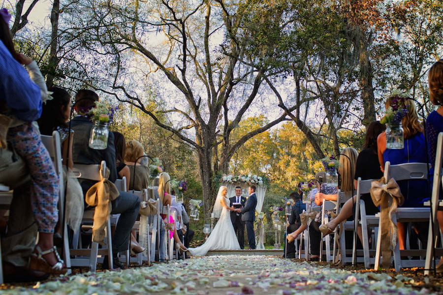 Outdoor Rustic Wedding Ceremony with Aisle of Rose Petals and Floral Decorated Wedding Altar | Plant City Wedding Photographer Jeff Mason Photography